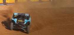 Brock Heger taking his final turn in his AIRAID-sponsored UTV before winning the championship